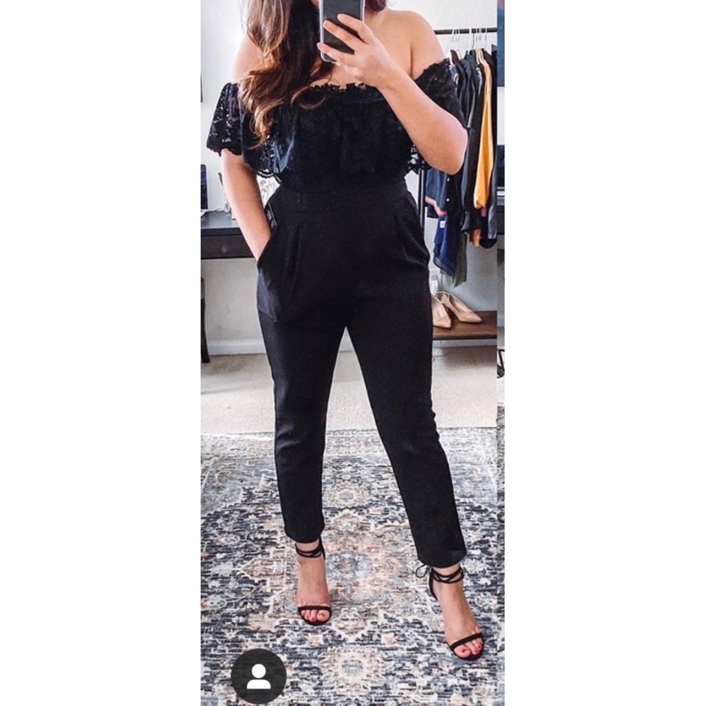 Express over the shoulder lace jumpsuit.